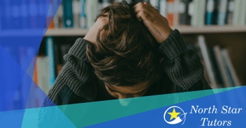 Frustrated Student Pulling Hair At Desk